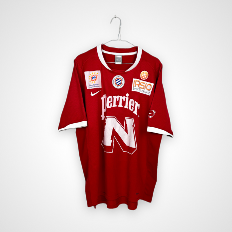 Montpellier football shirt, 2006/08 Home, good condition - slightly cracked sponsor prints on front, plus a few minor pulls.