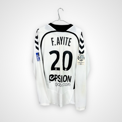 Koszulka piłkarska Stade De Reims, 2013/14 Away, stan zadowalający - kilka zabrudzeń oraz zniszczony nadruk sponsora na rękawie.