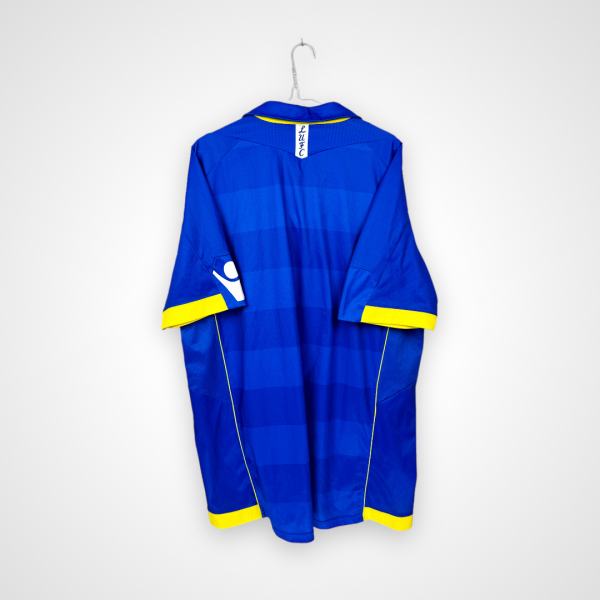 Koszulka piłkarska Leeds United FC, 2010/11 Away, stan dobry - brak loga 'macron' na jednym z rękawków, starta naszywka z rozmiarem na karku.- widok z tyłu