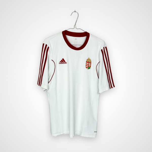 Koszulka piłkarska Węgry, stan zadowalający - popękany napis na plecach, mikro zaciągnięcia i zabrudzenia.