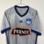 Koszulka piłkarska Emelec, 2017 Away, stan dobry - drobne pęknięcia na nadruku sponsora oraz kilka nieznacznych zabrudzeń, zaciągnięć oraz zmechaceń materiału.-