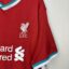 Koszulka piłkarska Liverpool FC, 2020/21 Home, stan bardzo dobry - mikro zaciągnięcia na plecach.- widok dodatkowy 3