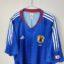 Japan football shirt, 2004/06 Home, satisfactory condition - two small holes on the front and a few micro-pulls.- close-up of front