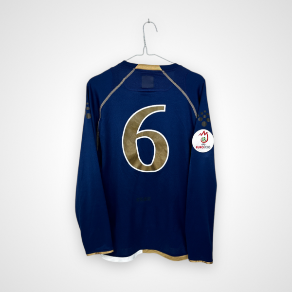 Koszulka piłkarska Szkocja, 2007/08 Home, stan dobry - nieznacznie spękane logo diadora na froncie, mikro zaciągnięcie nad numerem oraz delikatnie odklejający się