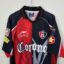 Atlas FC Fußballtrikot, 1998 Home, zufriedenstellender Zustand - erhebliche Anzahl von Mikrodehnungen und einige recht große auf der Vorderseite - Nahaufnahme der Vorderseite