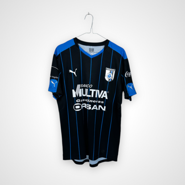 Koszulka piłkarska Queretaro FC, 2015/16 Home, stan zadowalający - uszkodzony herb klubowy oraz znaczna ilość mikro zaciągnięć.