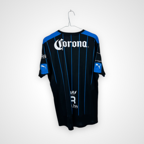 Photoroom_039_20250309_120738 Koszulka piłkarska Queretaro FC, 2015/16 Home, stan zadowalający - uszkodzony herb klubowy oraz znaczna ilość mikro zaciągnięć.- widok z tyłu