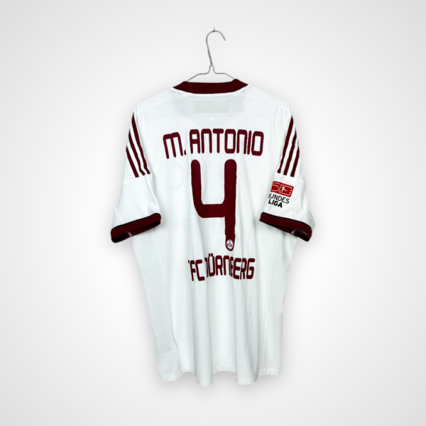 Koszulka piłkarska FC Nurnberg, 2012/14 Away, stan bardzo dobry - kilka drobnych zabrudzeń, możliwe że boiskowych.