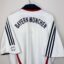 Koszulka piłkarska FC Bayern Monachium, 2006/08 Away, stan zadowalający - nieznacznie uszkodzony nadruk sponsora na froncie, zaciągnięcie oraz mikro plamka.- widok