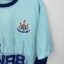 Koszulka piłkarska Newcastle United FC, 2022/23 Fourth, stan zadowalający - kilka mikro plamek na froncie i na rękawku oraz drobne zaciągnięcie na plecach.- widok