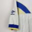 Leeds United FC football shirt, 1986/88 Home, poor condition - two red spots and a significant tear in the fabric on the side of the shirt under the armpit.Additional view 5