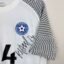 Koszulka piłkarska Estonia, 2021/24 Away, stan zadowalający - zabrudzenia na froncie oraz poszarpany materiał z boku koszulki.- widok dodatkowy 3