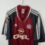Koszulka piłkarska Koszulka piłkarska FC Bayern Monachium, 2001/02 Home, stan zadowalający - znaczna ilość niewielkich zaciągnięć oraz defekt nadruku sponsora na
