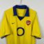 Arsenal FC football shirt, 2003/04 Away, satisfactory condition - damaged sponsor logo on front, minor soiling next to manufacturer's stamp and some micro
