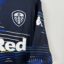 Leeds United FC football shirt, 2018/19 Away, poor condition - heavily damaged prints on both front and back of shirt.Additional view 3