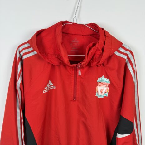 IMG_4536 Liverpool FC football shirt, 2008/10, poor condition - several holes on back, soiling on sleeve and cracked print on back of jacket.- close-up of front