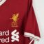 Koszulka piłkarska Liverpool FC, 2017/18 Home, stan słaby - wyraźne plamy na froncie koszulki, mikro pęknięcia na nadruku sponsora oraz na paskach na plecach.-