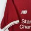 Koszulka piłkarska Liverpool FC, 2017/18 Home, stan słaby - wyraźne plamy na froncie koszulki, mikro pęknięcia na nadruku sponsora oraz na paskach na plecach.-