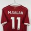 Koszulka piłkarska Liverpool FC, 2017/18 Home, stan słaby - wyraźne plamy na froncie koszulki, mikro pęknięcia na nadruku sponsora oraz na paskach na plecach.-
