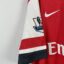 Koszulka piłkarska Arsenal FC, 2012/14 Home, stan bardzo dobry - mikro zaciągnięcie przy herbie oraz nieznacznie urwany szew.- widok dodatkowy 4