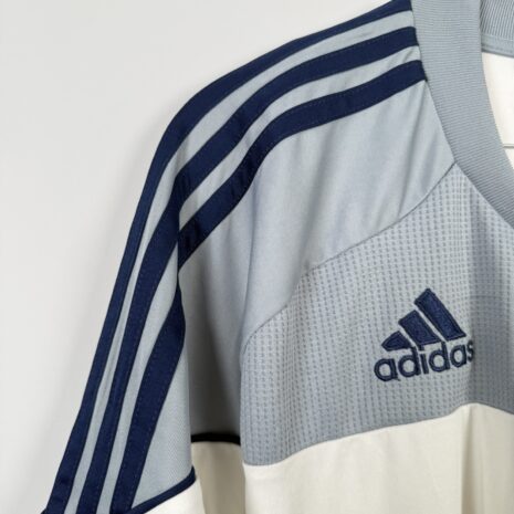 IMG_9743 Koszulka piłkarska AL Hilal SFC, 2010/11 Away, stan dobry - uszkodzony napis 'formotion', mikro pęknięcia wokół nadruku sponsora oraz jedno drobne zaciągnięcie.-